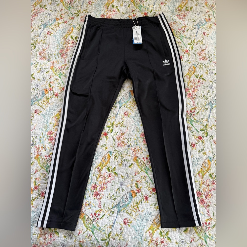 adidas Black SST Track Pants NWT. Soccer style. Very flattering.